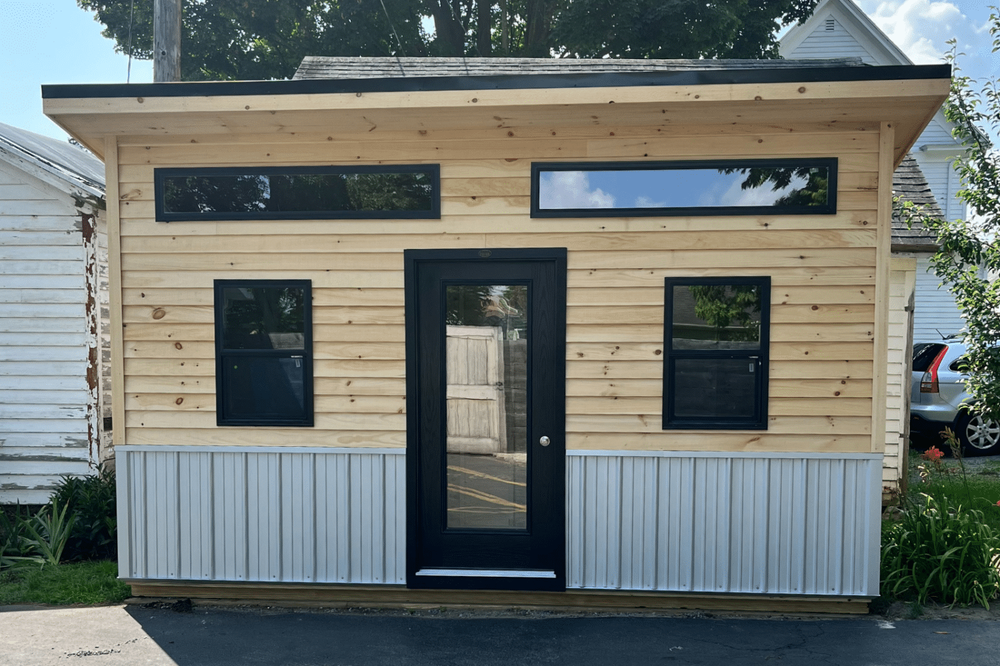 6x16 modern shed with black door in mt morris ny
