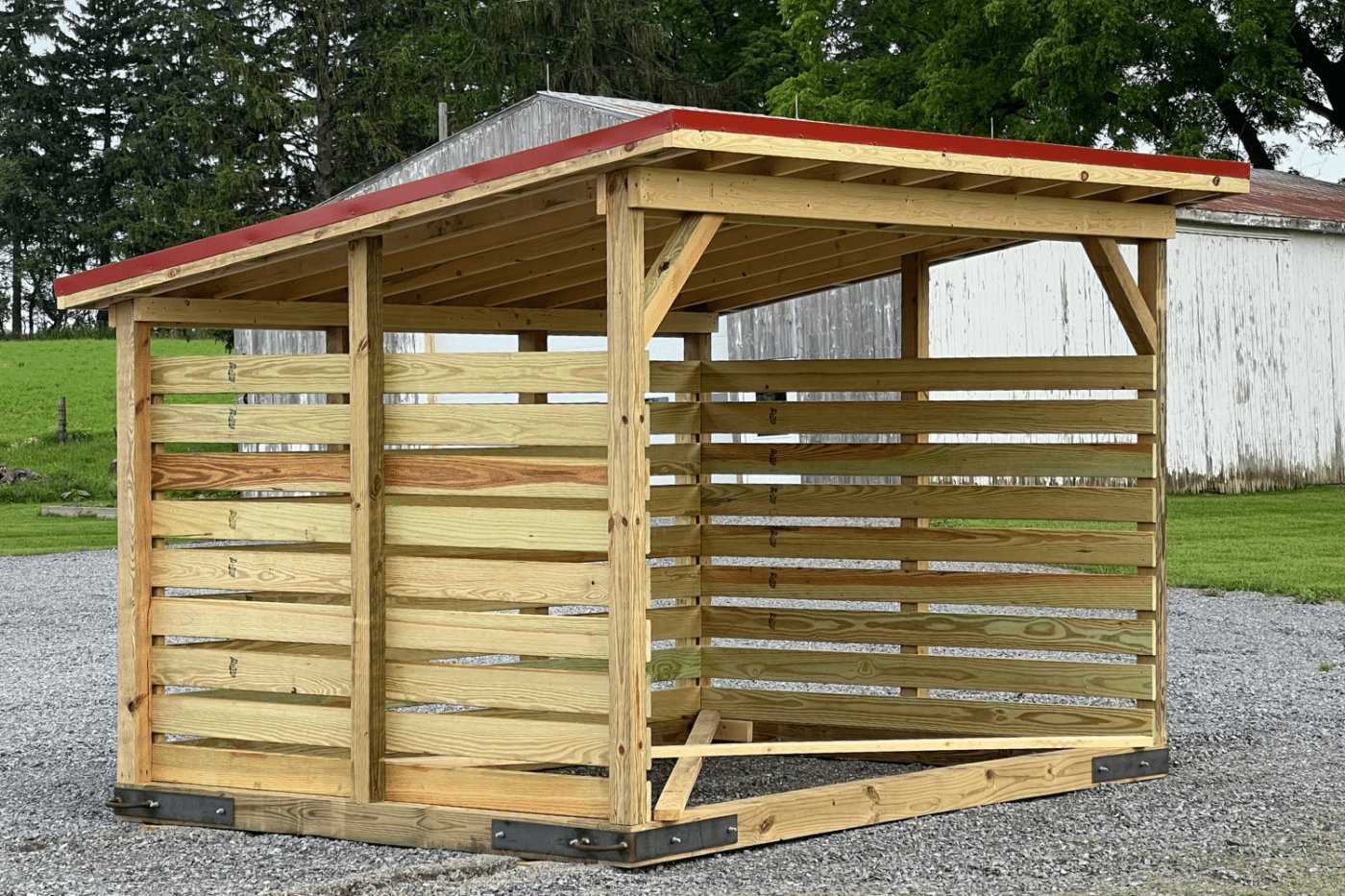 8x12 firewood shed with red roof in west falls ny